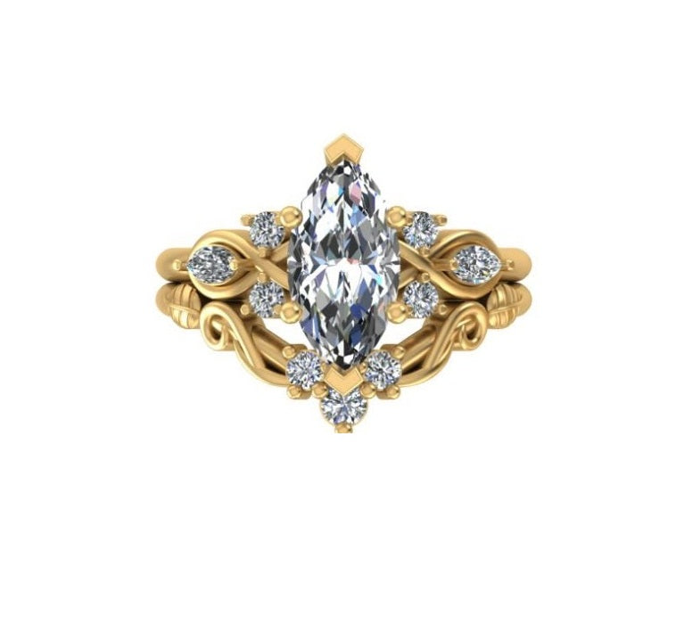 Marquise cut lab grown diamond bridal ring set in yellow gold with leaf-shaped diamond accents and a fitted contour wedding band.