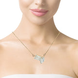 Modern two-stone marquise and radiant lab diamond necklace in yellow gold