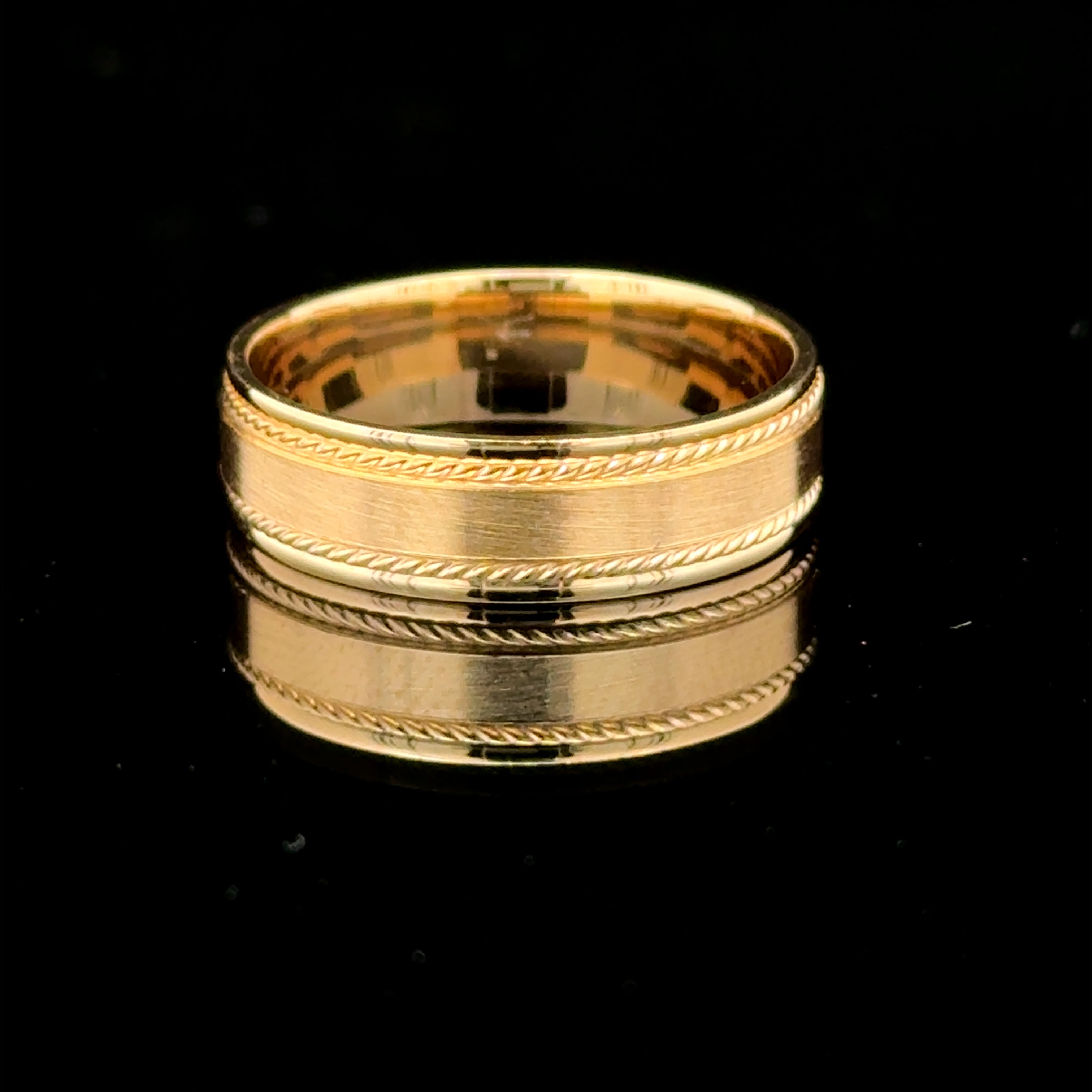 Brushed yellow gold men’s wedding band with polished rope-edge details available at solomon jeweler kansas.
