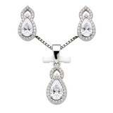 Silver pendant with moissanite pear drop earrings and matching necklace set, elegant jewelry from Solomon Jewelers.