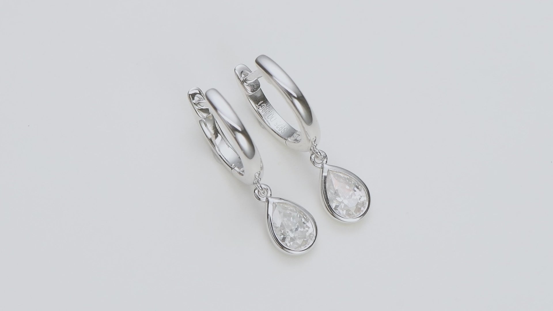 silver and moissanite tear drop earrings