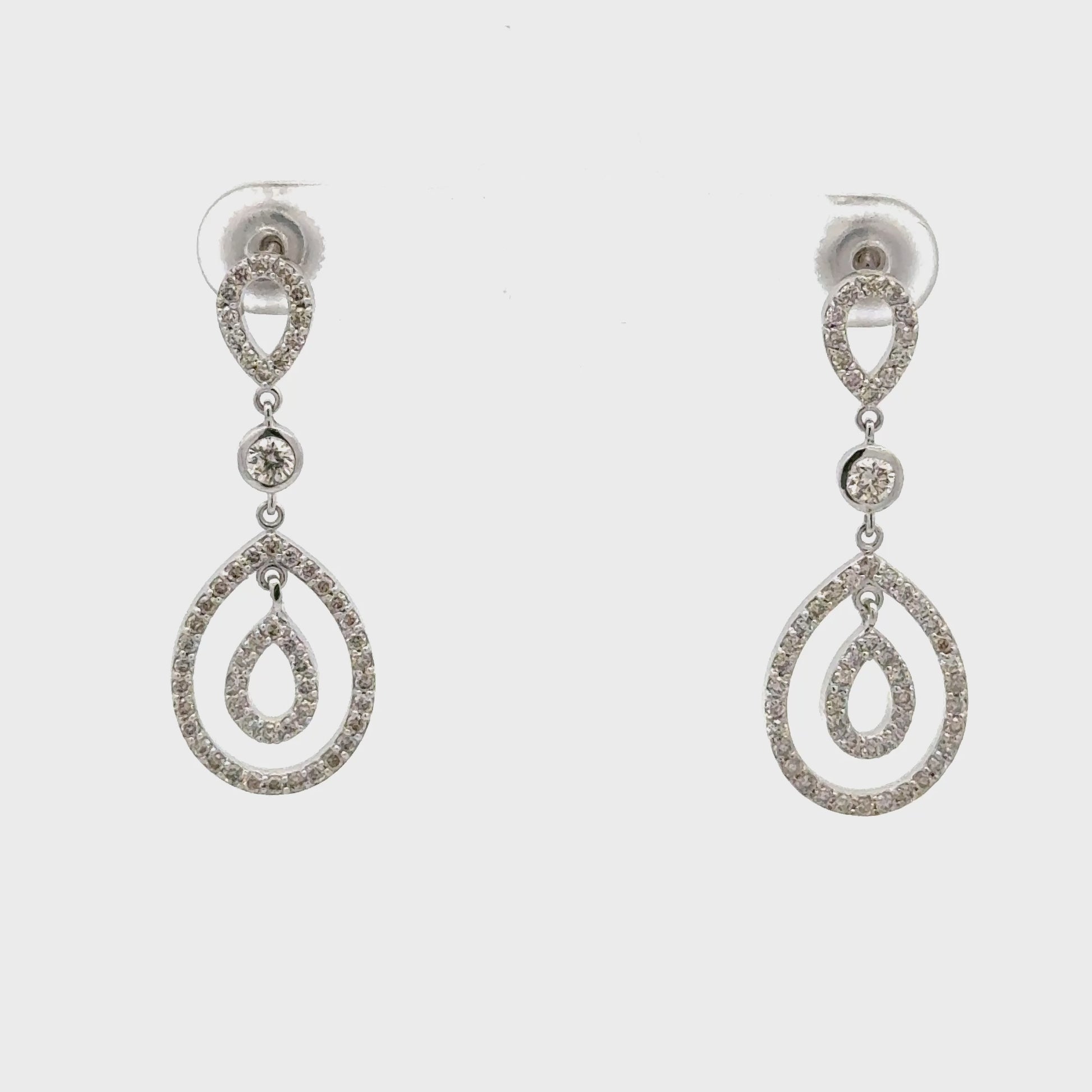 Floating Inner Teardrop Diamond Earrings