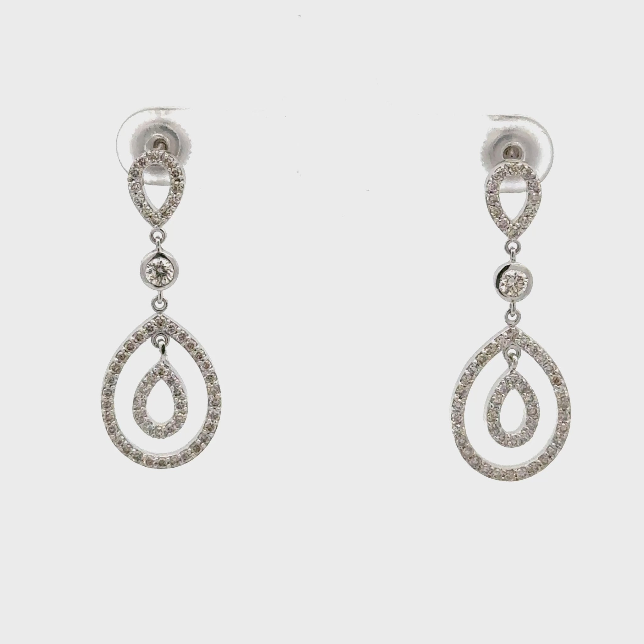 Floating Inner Teardrop Diamond Earrings