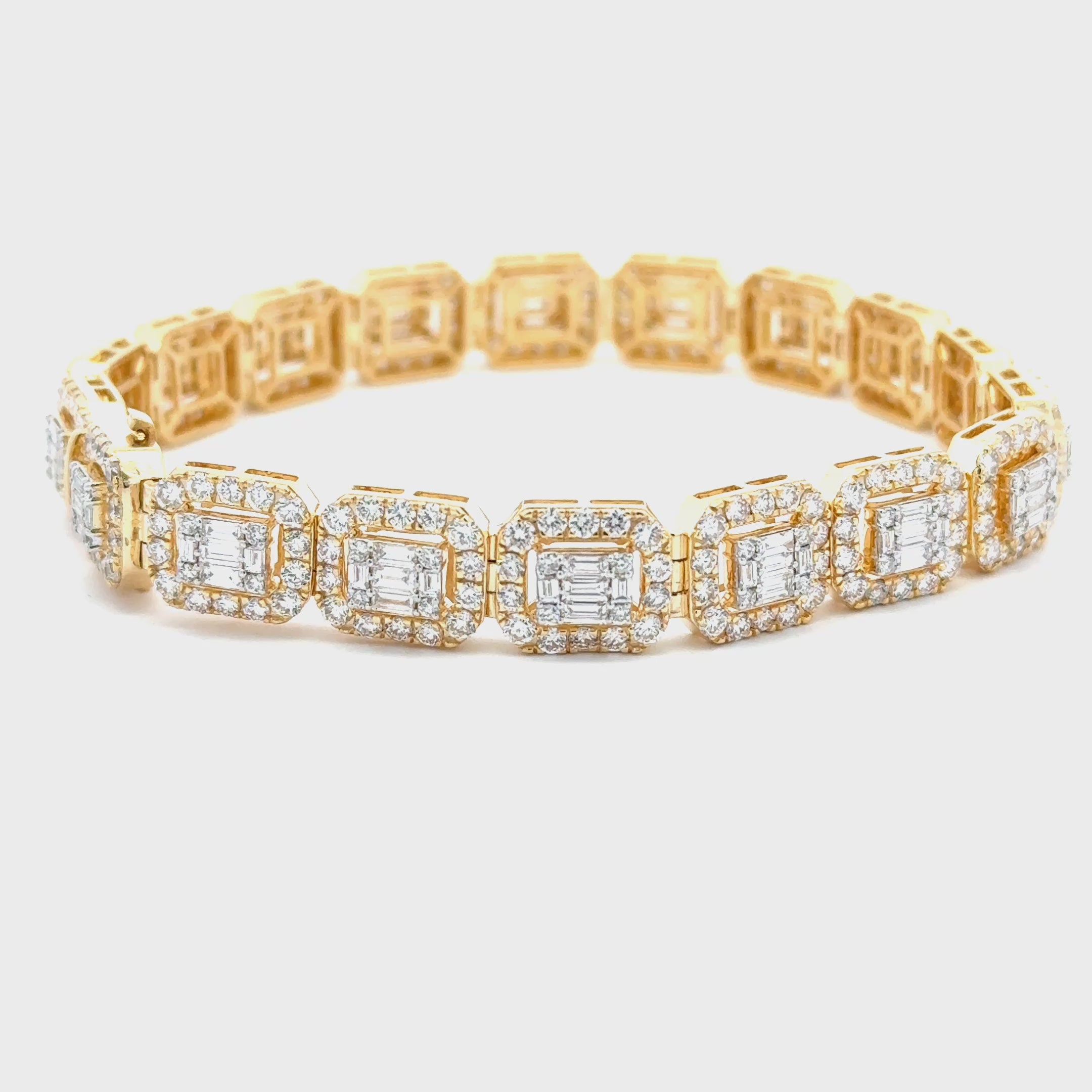 Video Yellow Gold and diamond bracelet with baguette and round diamonds.