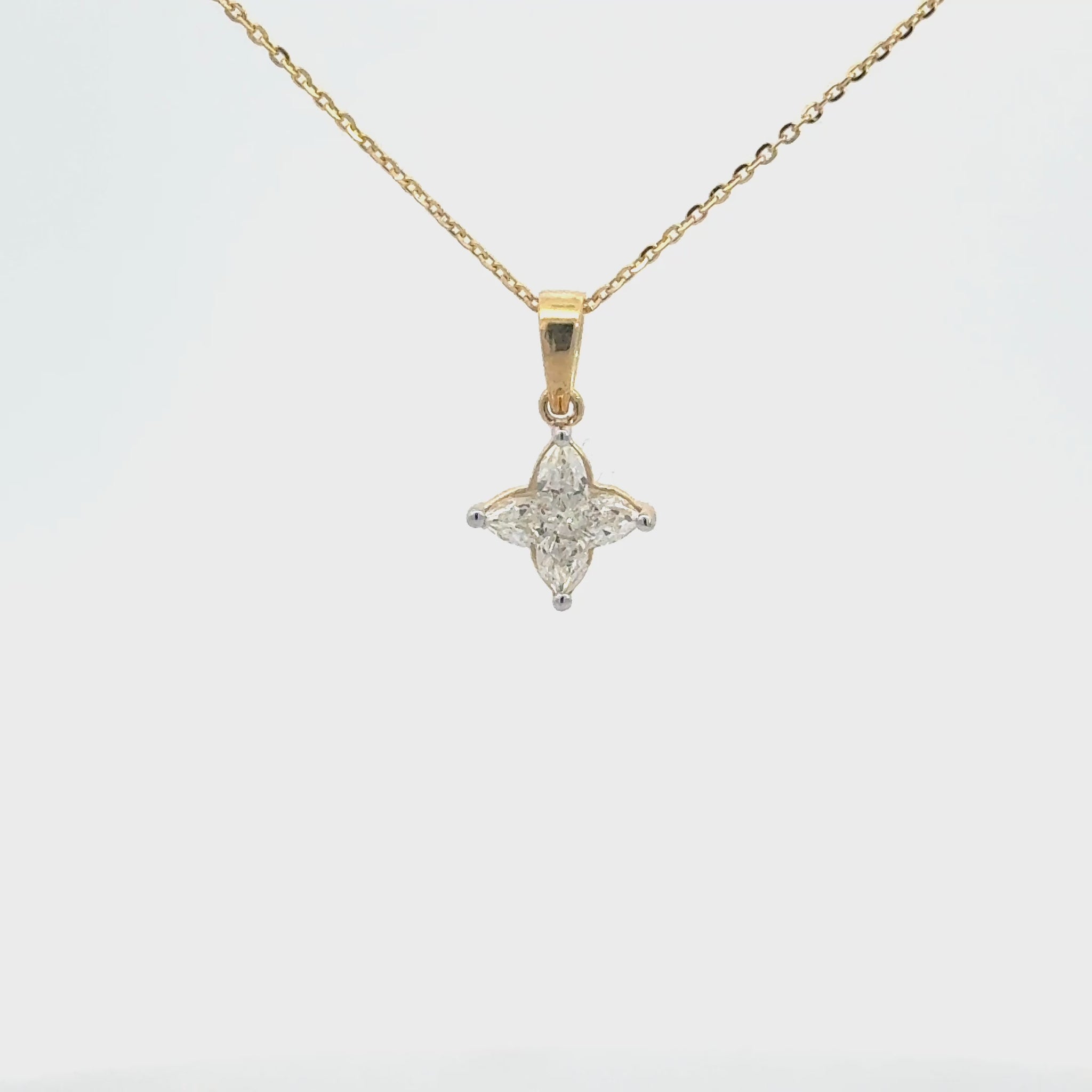 14K gold lab lily-cut solitaire diamond necklace with floral-inspired diamond design.