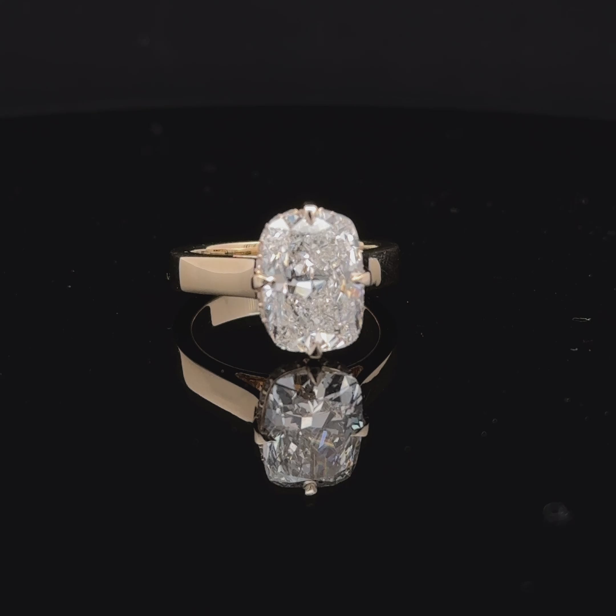 Cushion cut diamond engagement ring with cigar band from Solomon Jewelers Wichita Kansas