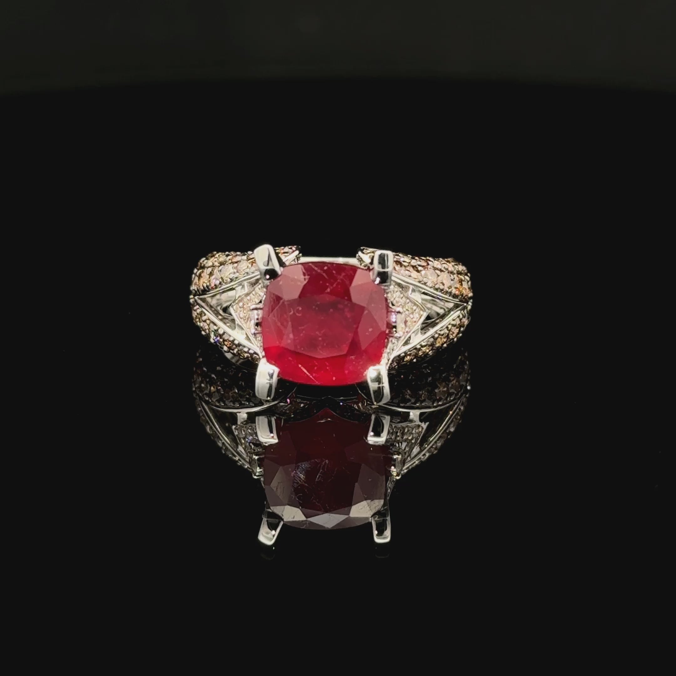 14K white gold ring with cushion-cut natural ruby, chocolate diamond pave accents and split-shank design