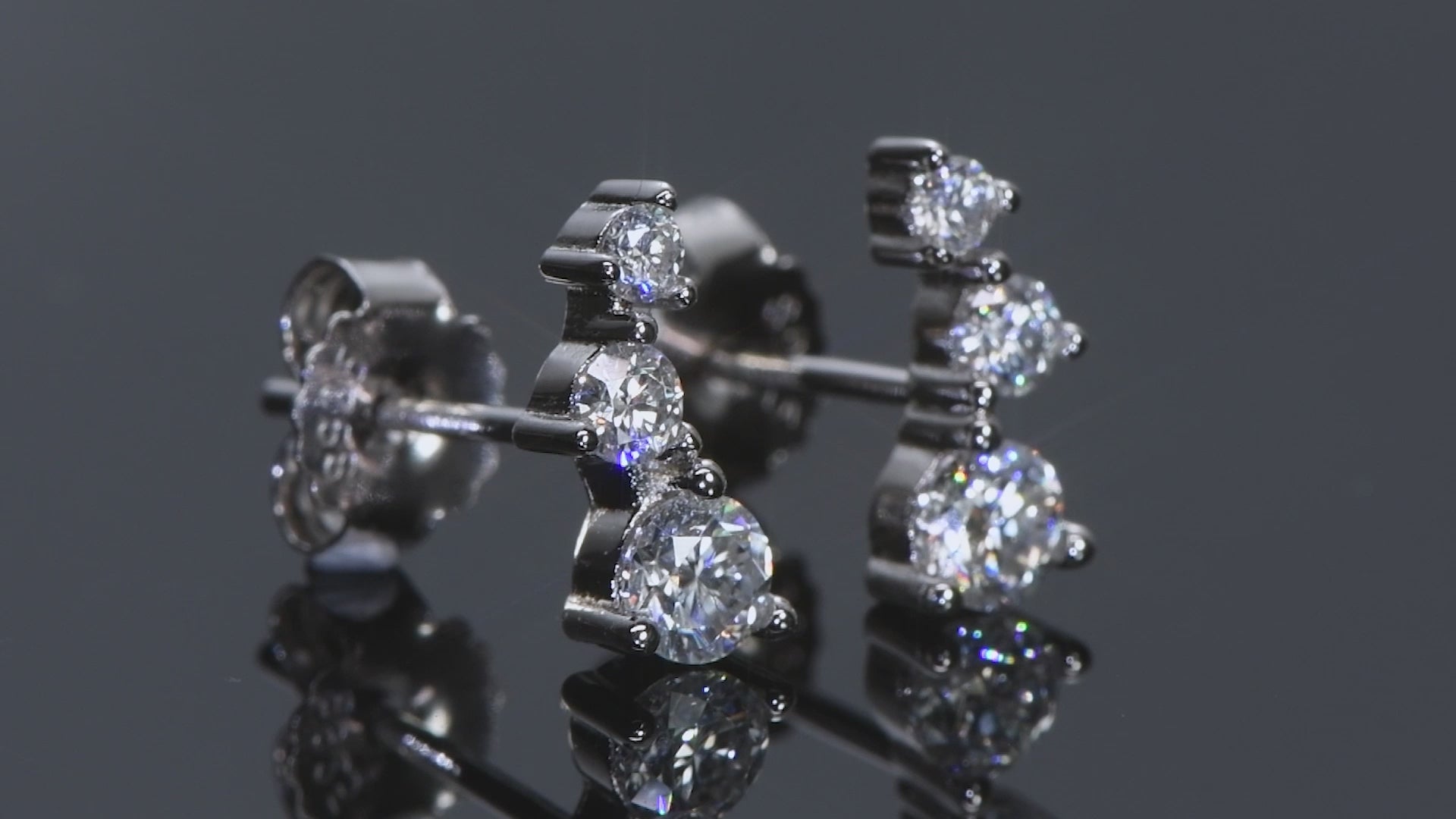 moissanite three stone earrings in sterling silver