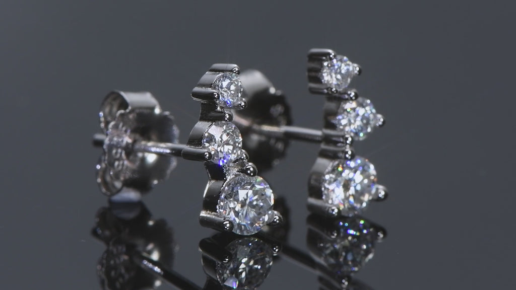 moissanite three stone earrings in sterling silver