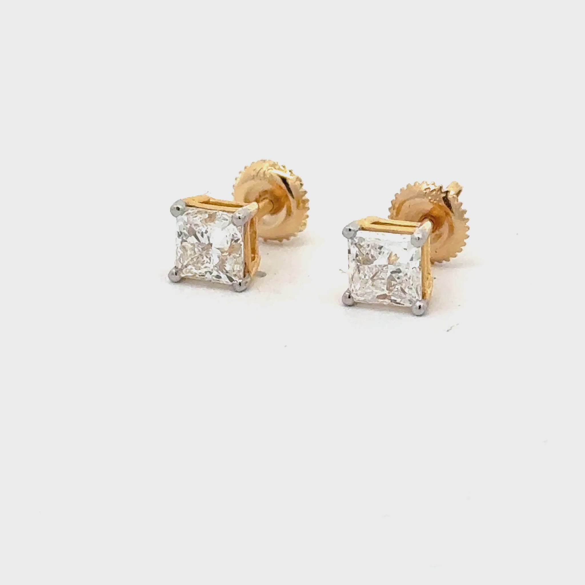 Close-up of Princess Cut Diamond Stud Earrings video in 14K Gold