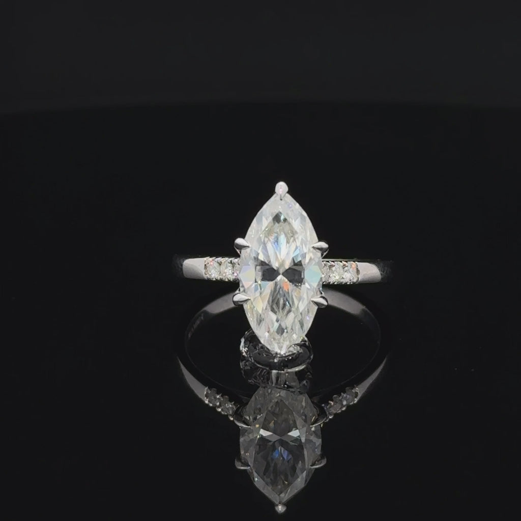 Marquise moissanite silver ring with six prongs and round sparkling shoulder accents