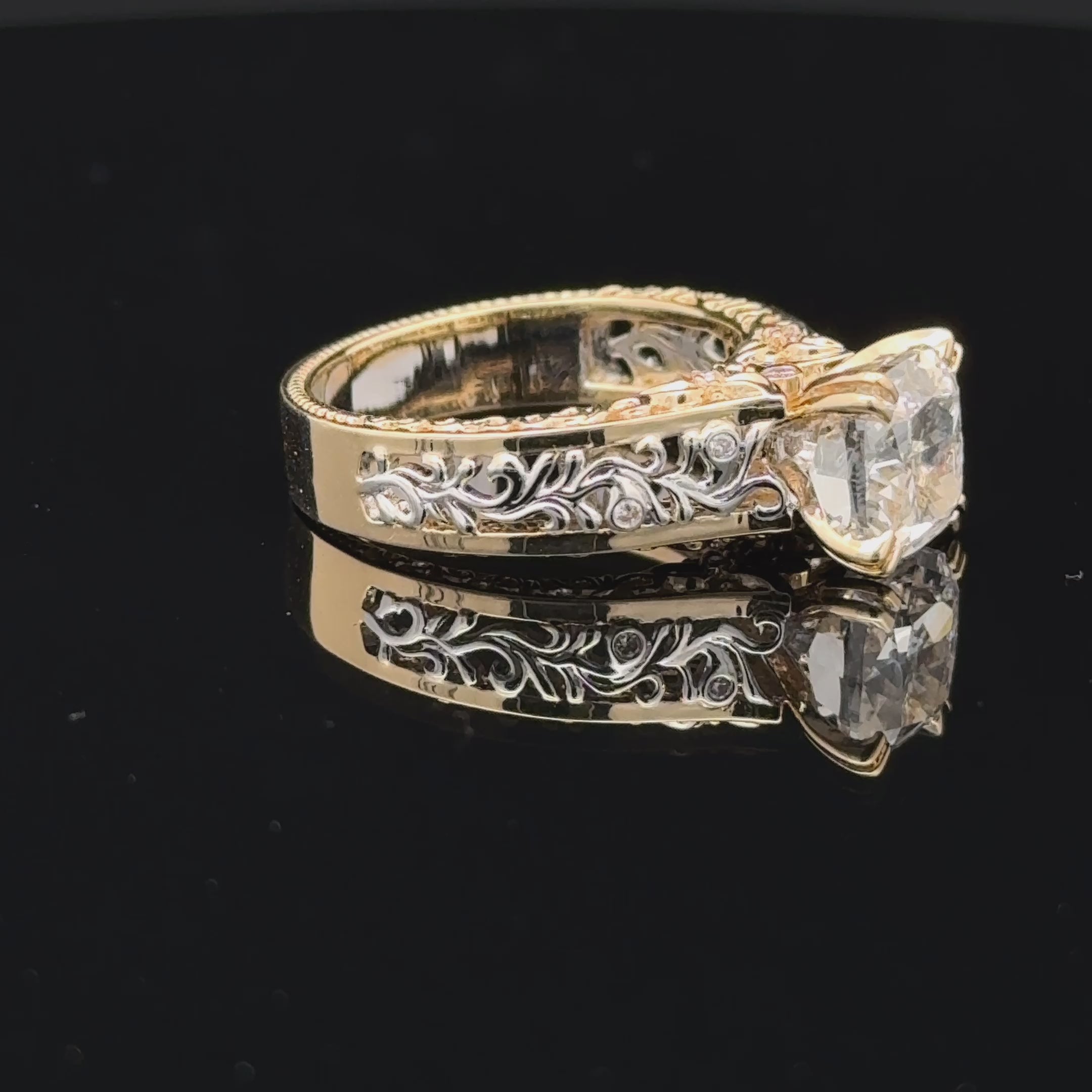 14K two-tone gold ring with a 3-carat cushion-cut lab-grown diamond, filigree scrollwork and round diamond accents.