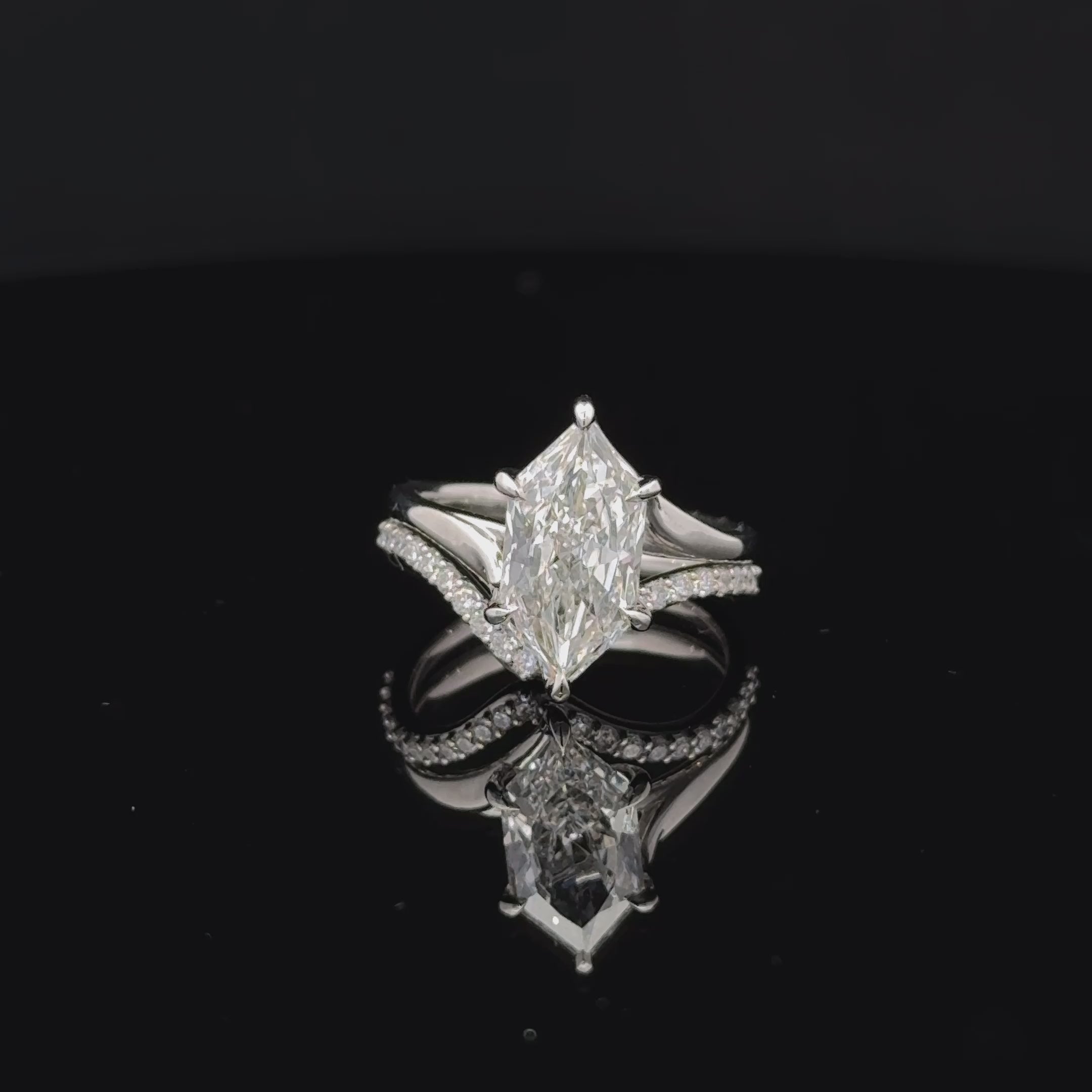 Platinum pave lab diamond ring with elongated Dutch marquise center stone