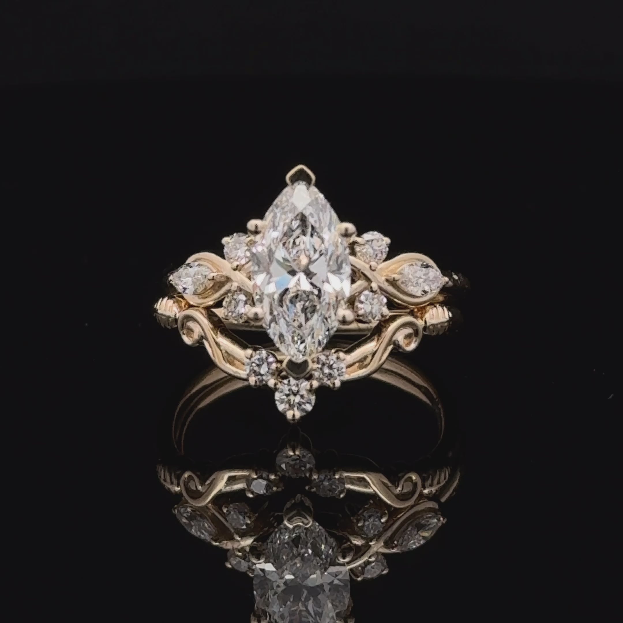 Marquise cut lab-grown diamond bridal ring set in yellow gold with nature inspired designed with contour wedding band.