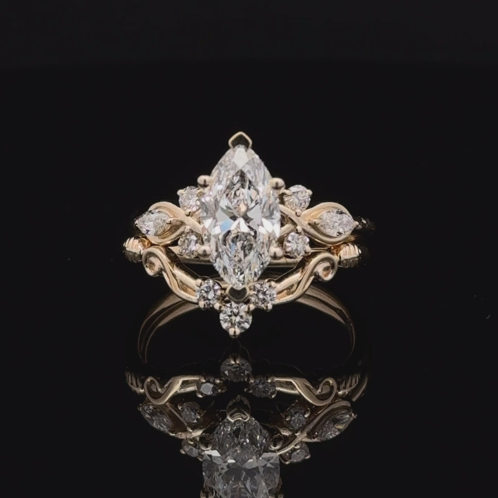 Marquise cut lab-grown diamond bridal ring set in yellow gold with nature inspired designed with contour wedding band.