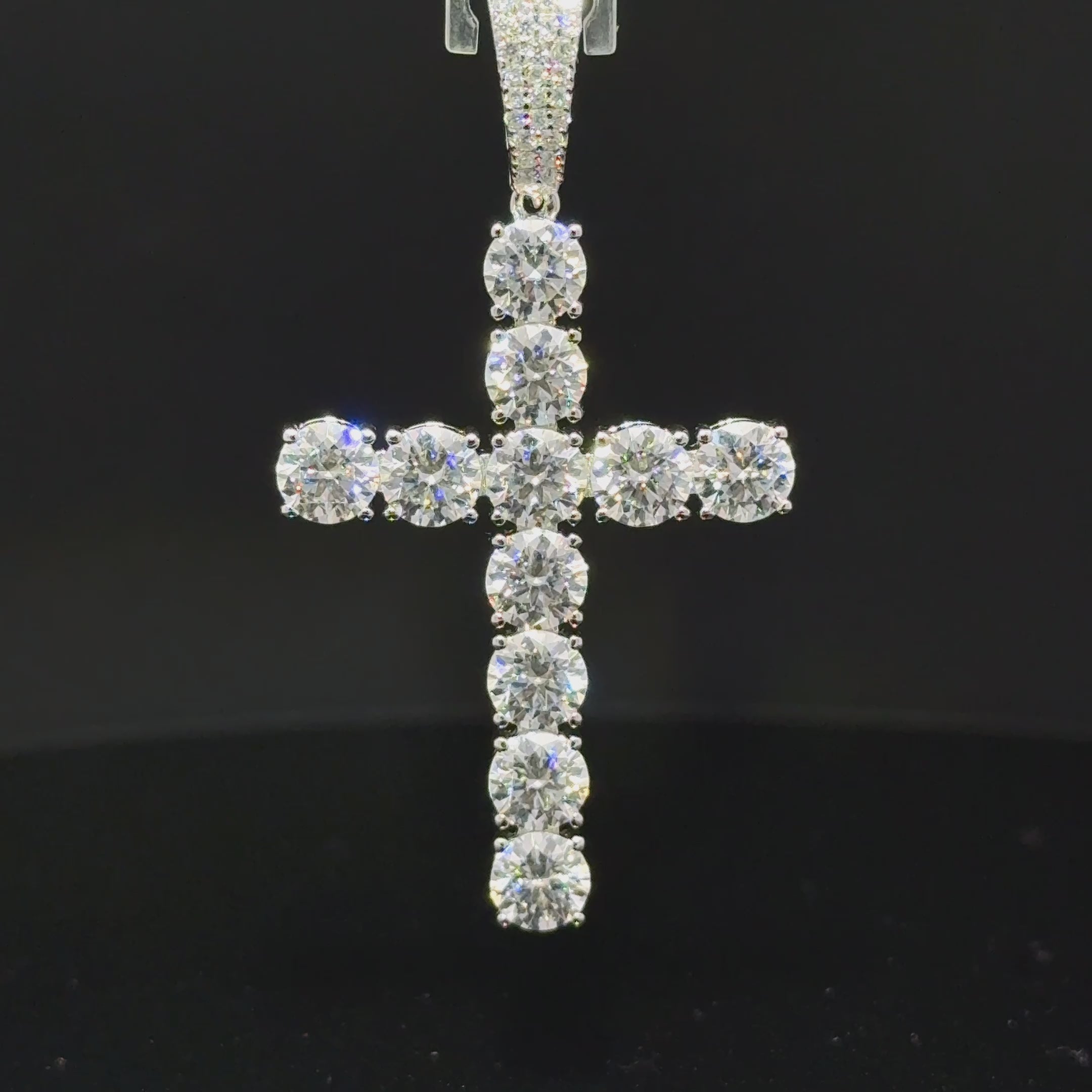 iced cross pendant close up moissanite stones
