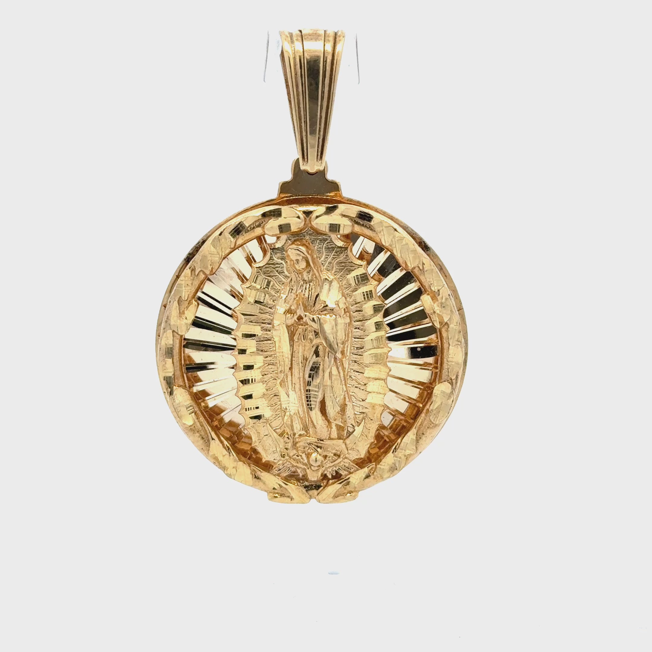 Solid virgin mary yellow gold pendant. Solomon Jeweler kansas