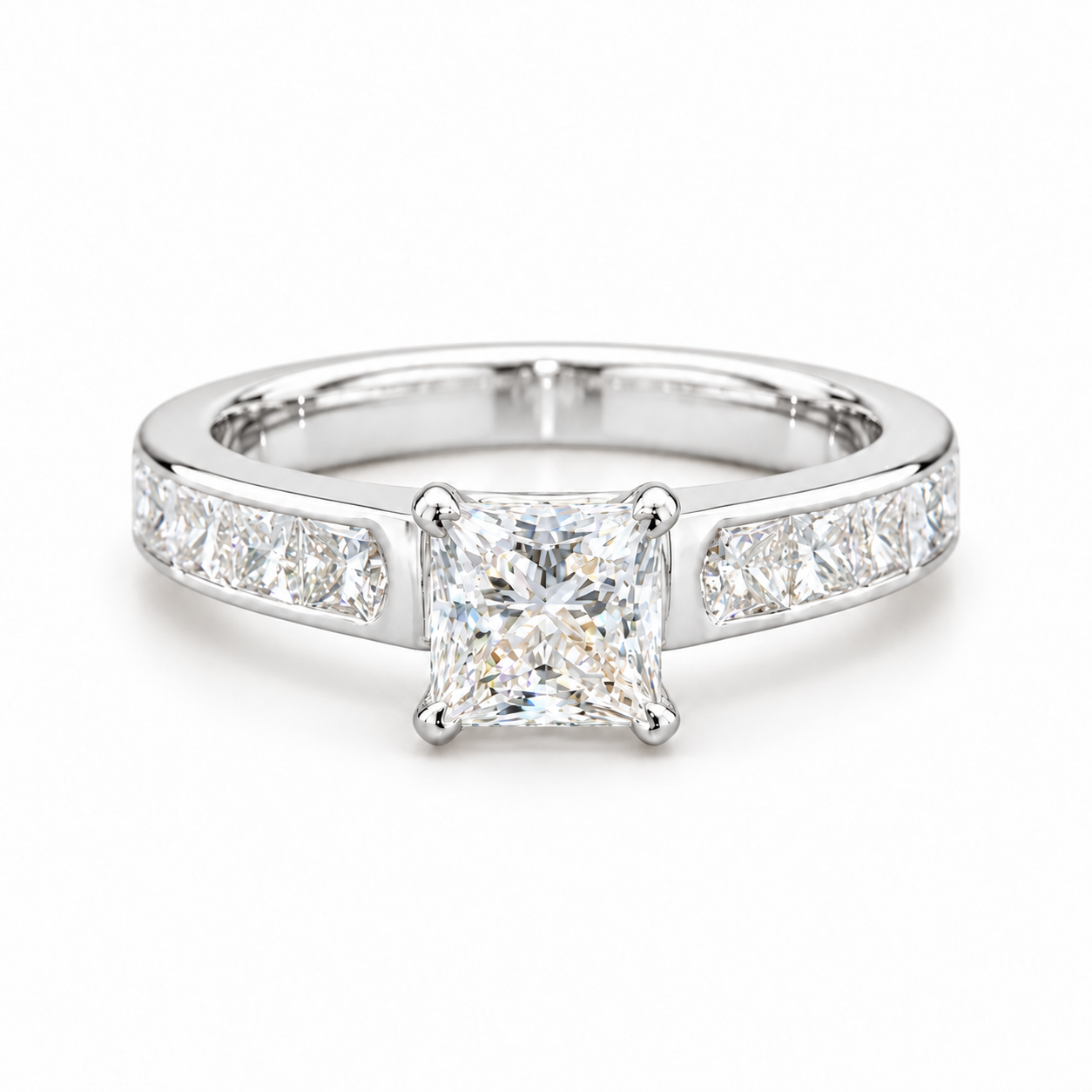A princess cut diamond engagement ring with a channel set band featuring princess diamonds on either side.
