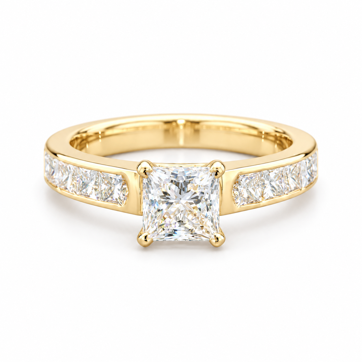 A yellow gold engagement ring featuring a large princess-cut diamond center stone and smaller diamonds set along the band, shown on a clean white background.