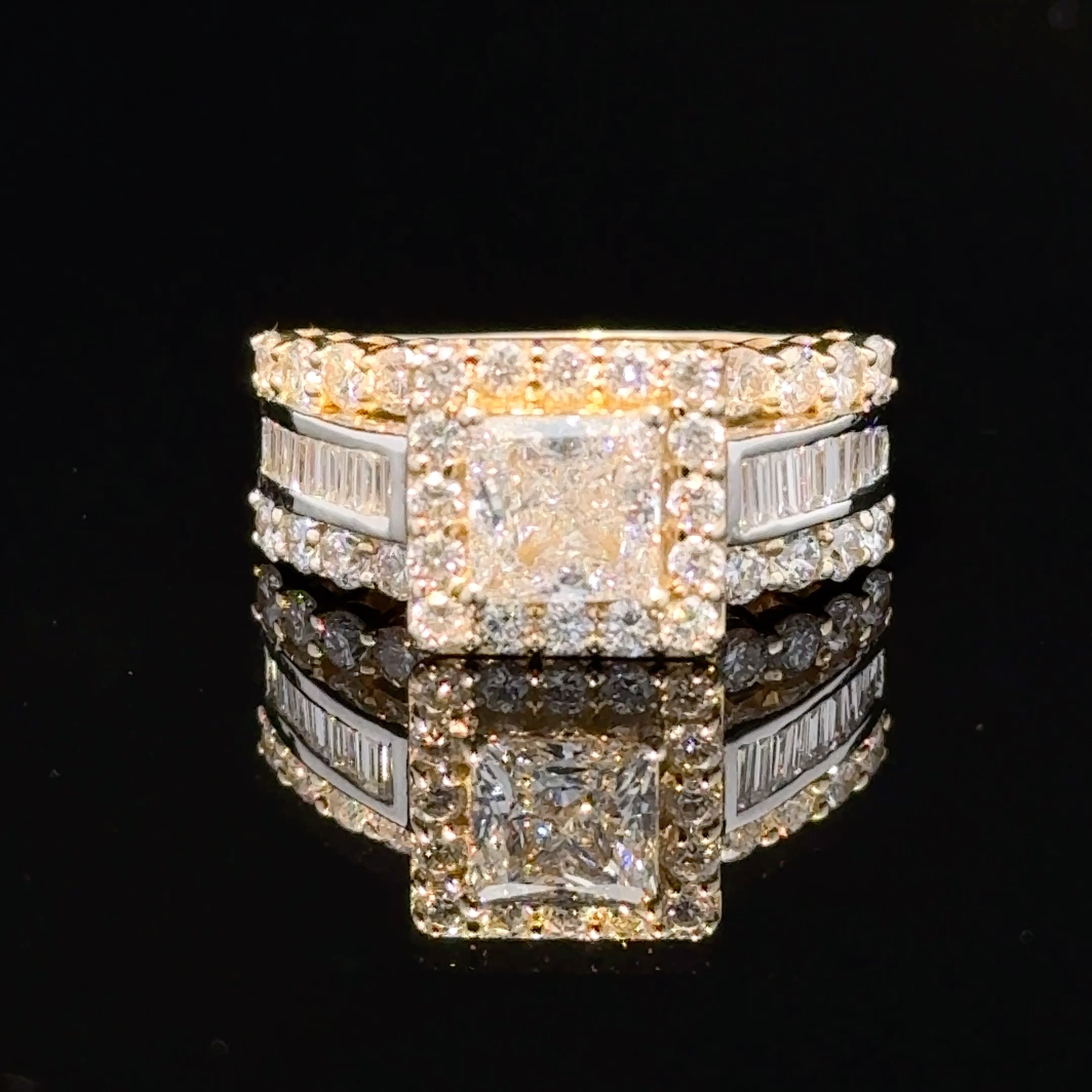 Princess-cut lab diamond engagement ring in 14k gold with a solitaire setting, featuring a sparkling central diamond.