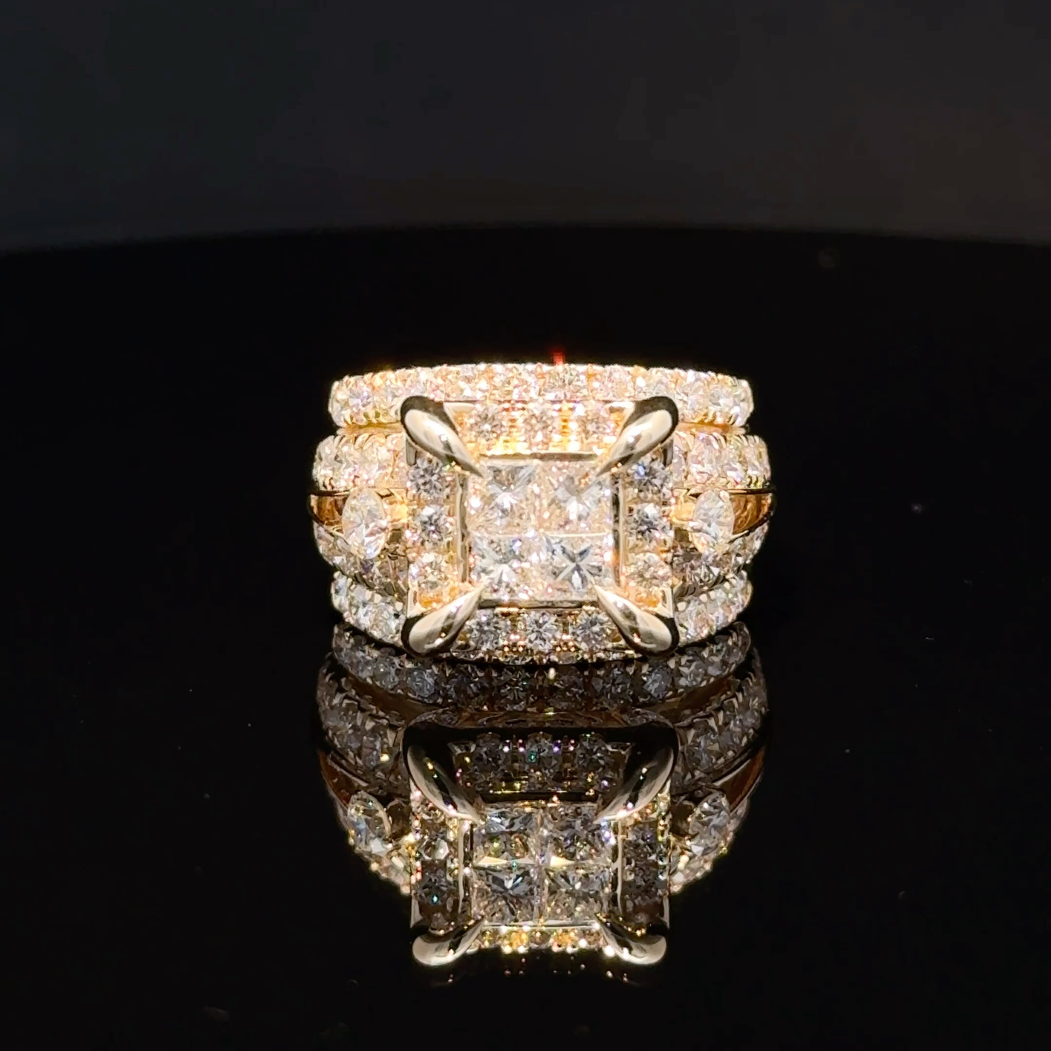 Solomon Jewelers 4 1/6 CT. T.W. princess-cut lab diamond engagement ring in 14k gold with round diamond accents.