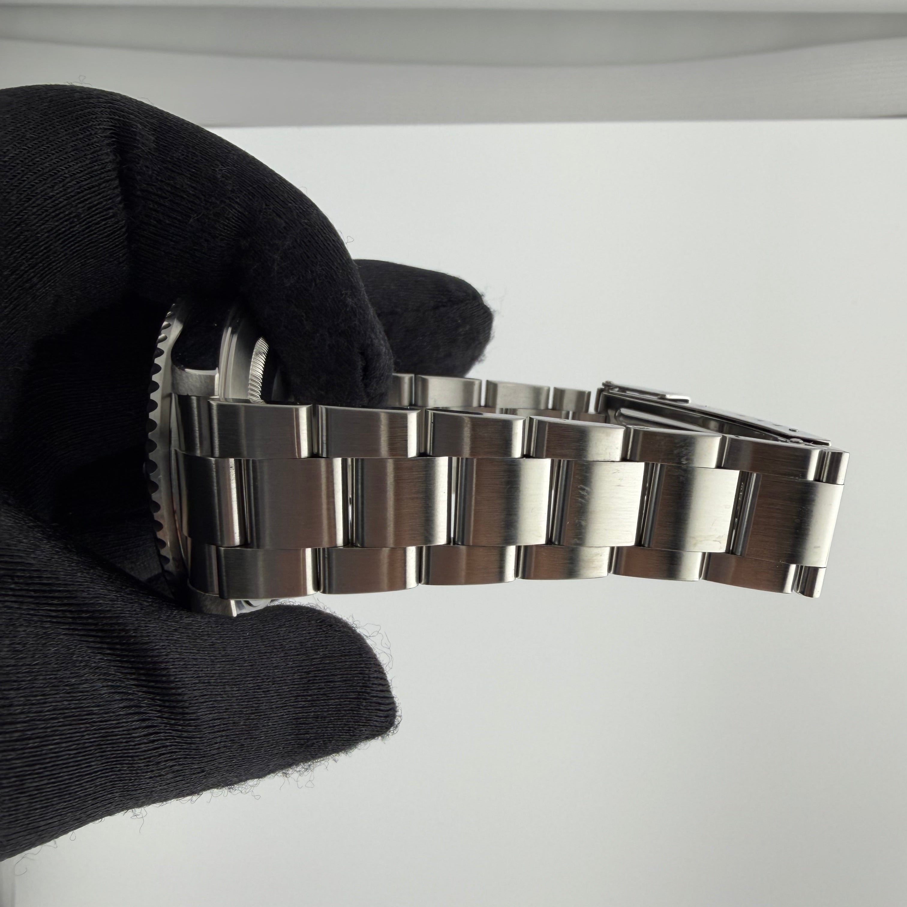 Rolex Submariner watch with black dial and stainless bracelet available at Solomon Jeweler kansas.