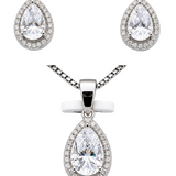 Silver and moissanite pear-shaped earrings and pendant necklace set from Solomon Jewelers, elegant matching jewelry ensemble.