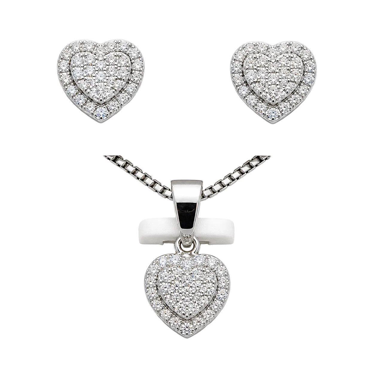 Silver moissanite heart earrings and pendant necklace set by Solomon Jewelers, featuring elegant matching jewelry with sparkling stones.