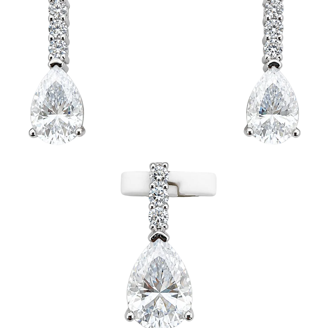 Silver and moissanite pear drop earrings and pendant necklace set by Solomon Jewelers, featuring elegant matching jewelry.
