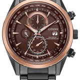 Citizen Eco-Drive Rado Controlled chronograph watch with a dark brown dial, rose gold bezel, and black stainless steel case and link bracelet.