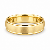 Brushed yellow gold men’s wedding band with polished step raised edges available at Solomon jeweler Wichita Kansas.
