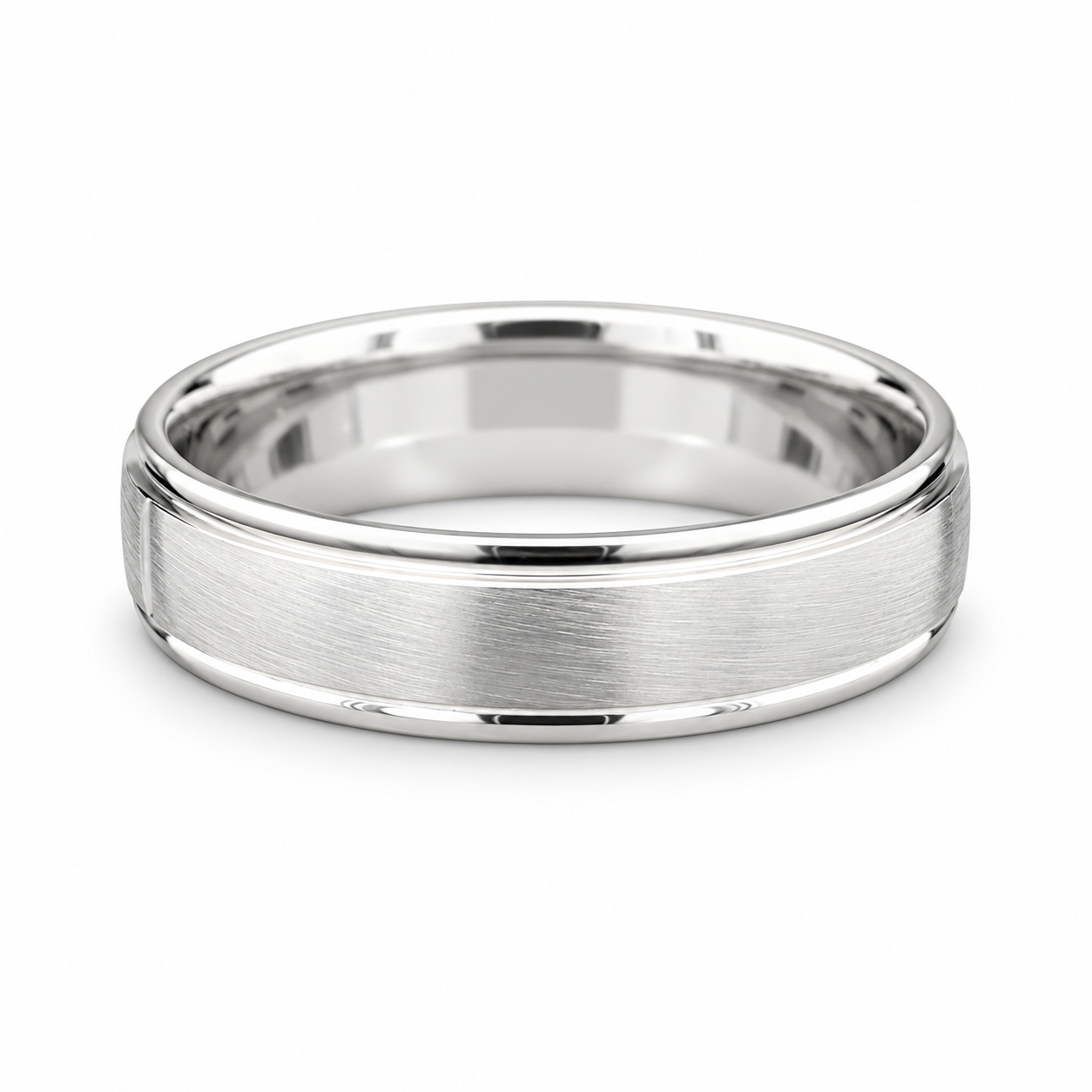 Brushed white gold men’s wedding band with polished raised edges available at Solomon Jewelers.