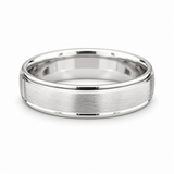 Brushed white gold men’s wedding band with polished raised edges available at Solomon Jewelers.