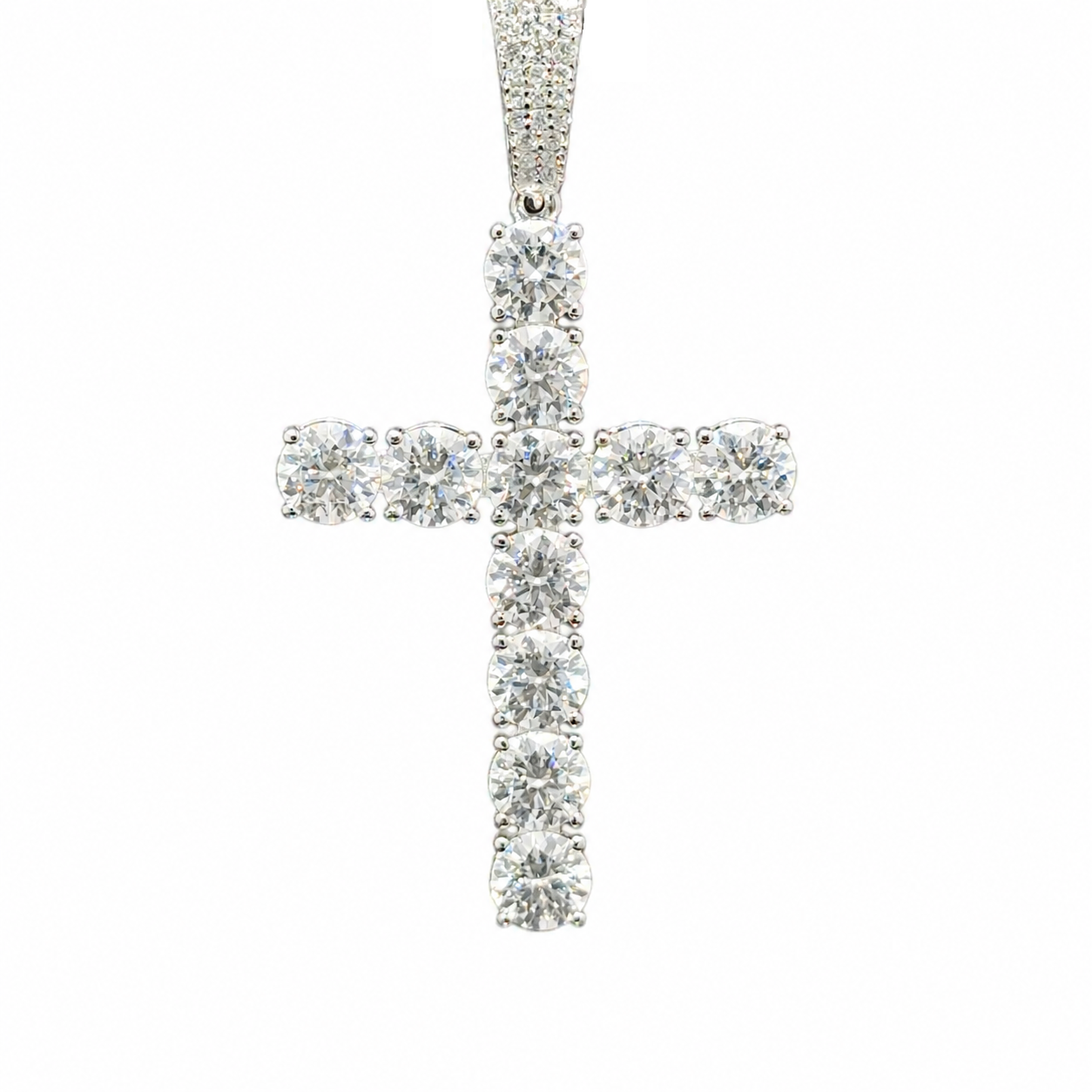Sterling silver moissanite cross pendant with round brilliant stone, religious necklace from Solomon Jewelers.