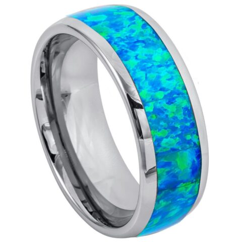 Ring with blue and green opal inlay on a white background
