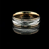 Shop this two-tone gold wedding band with a white-gold chevron pattern, black accents, milgrain borders, and complimentary inside engraving.