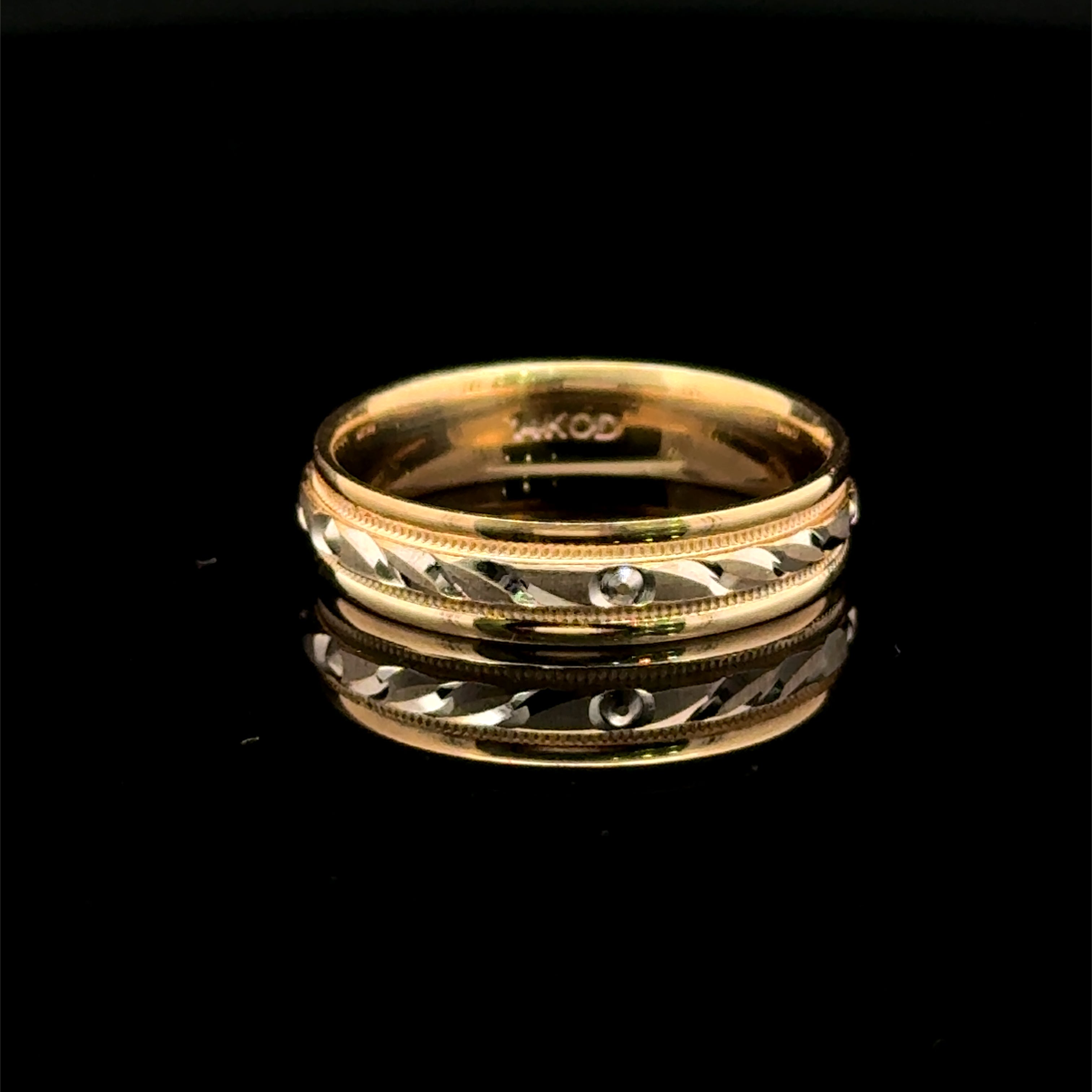 Leaf style mens wedding band available at Solomon Jeweler Kansas.