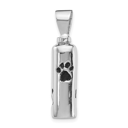 Sterling silver cylinder with paw print ash holder urn pendant designed to hold a small portion of ashes. A timeless memorial necklace for remembrance and comfort.