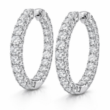 Women's 10K gold inside-out lab diamond hoop earrings with sparkling diamonds, showcasing a classic and elegant jewelry design.