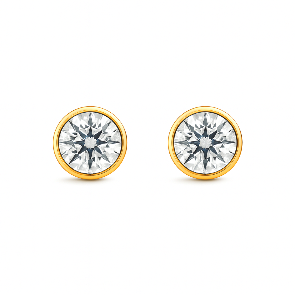Close-up of round bezel-set lab diamond stud earring in 14K gold.